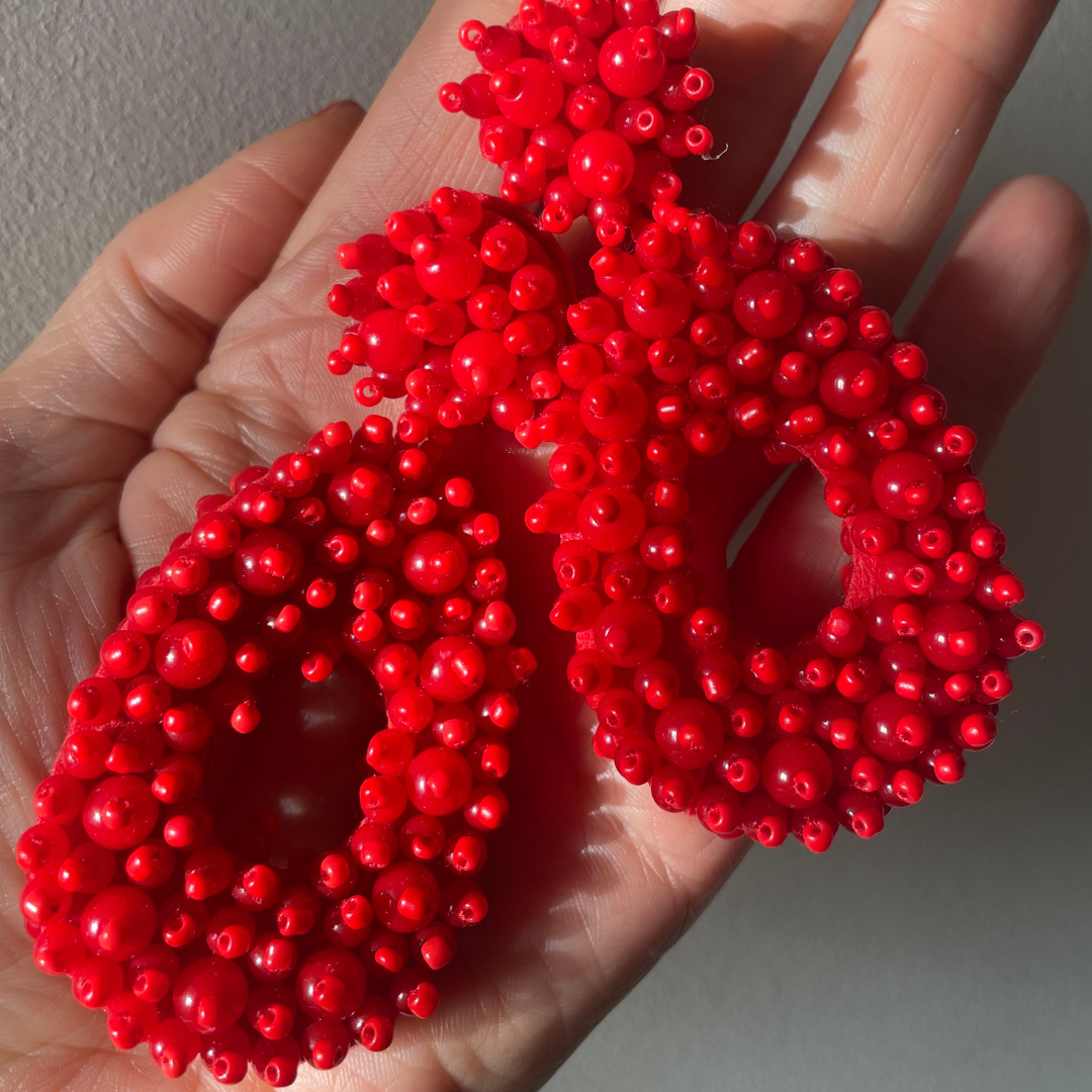 Red beaded statement earrings