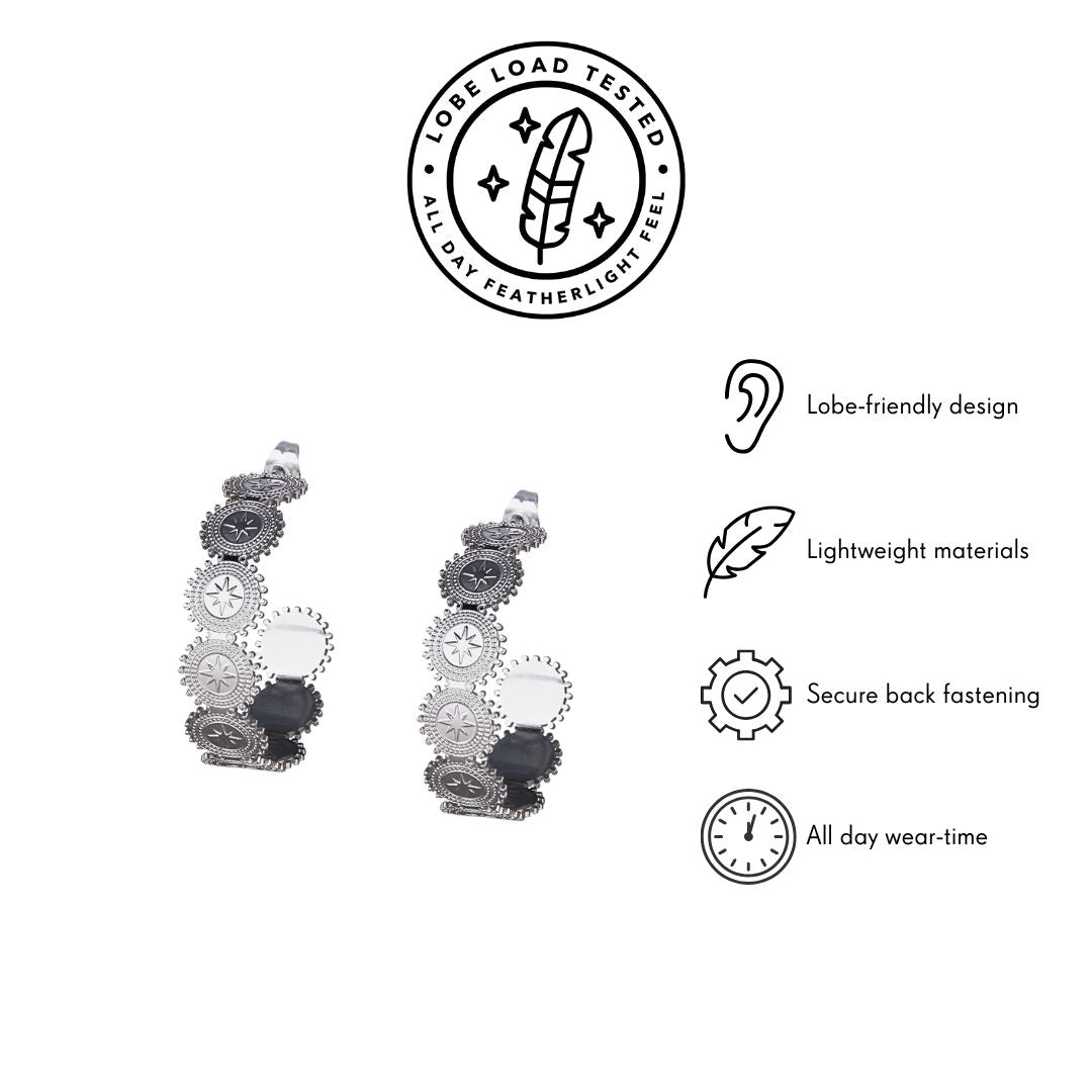 Star embossed silver hoops