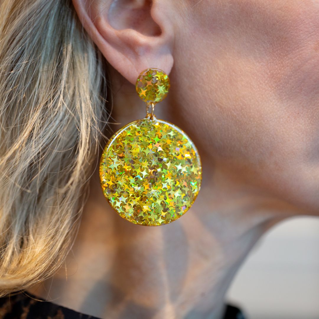 Yellow disco dangle earrings