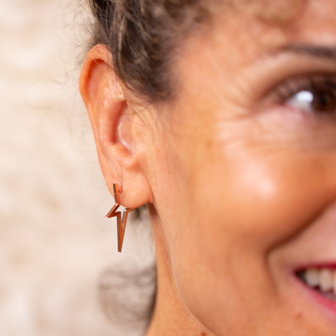 Rose gold star studs