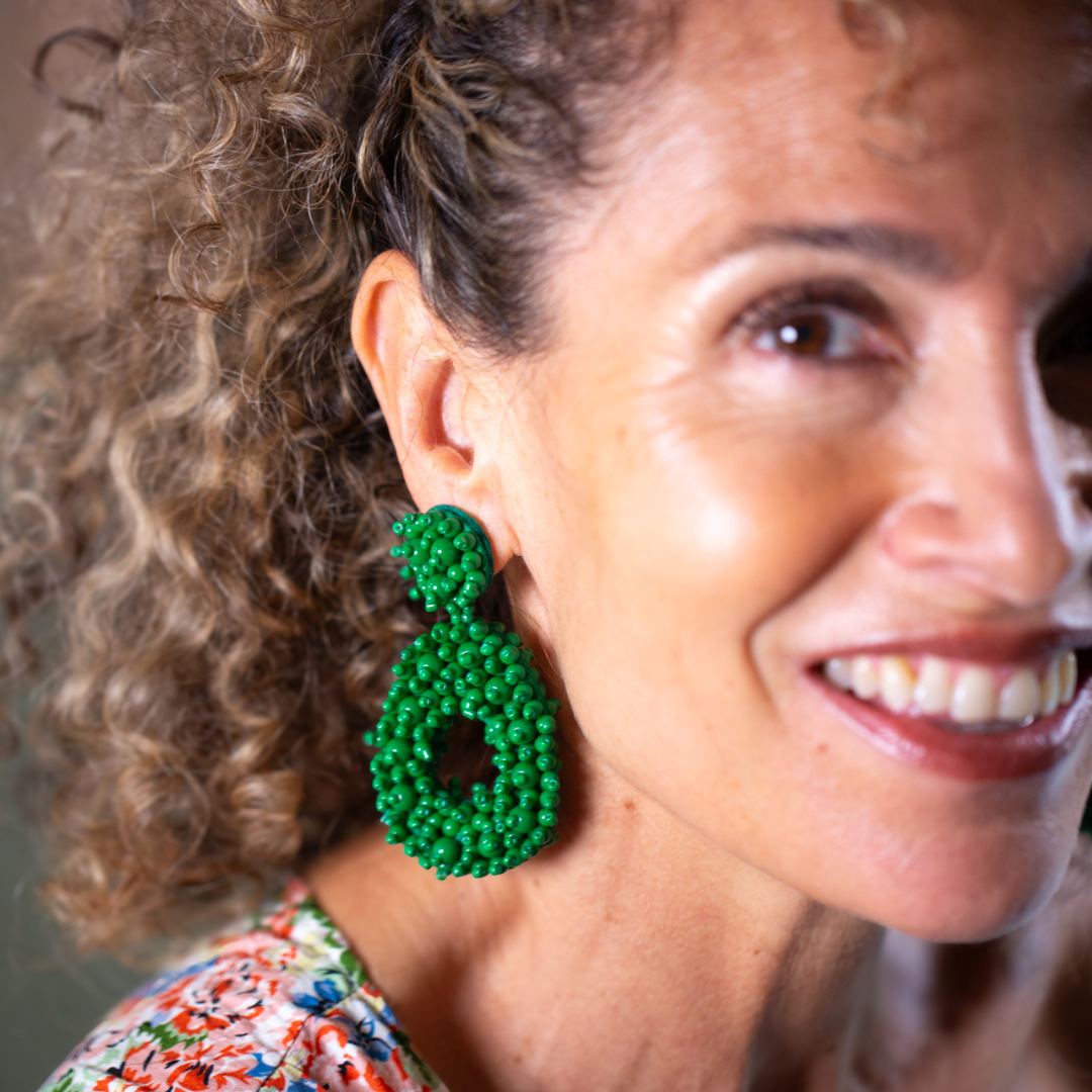 Green beaded statement earrings