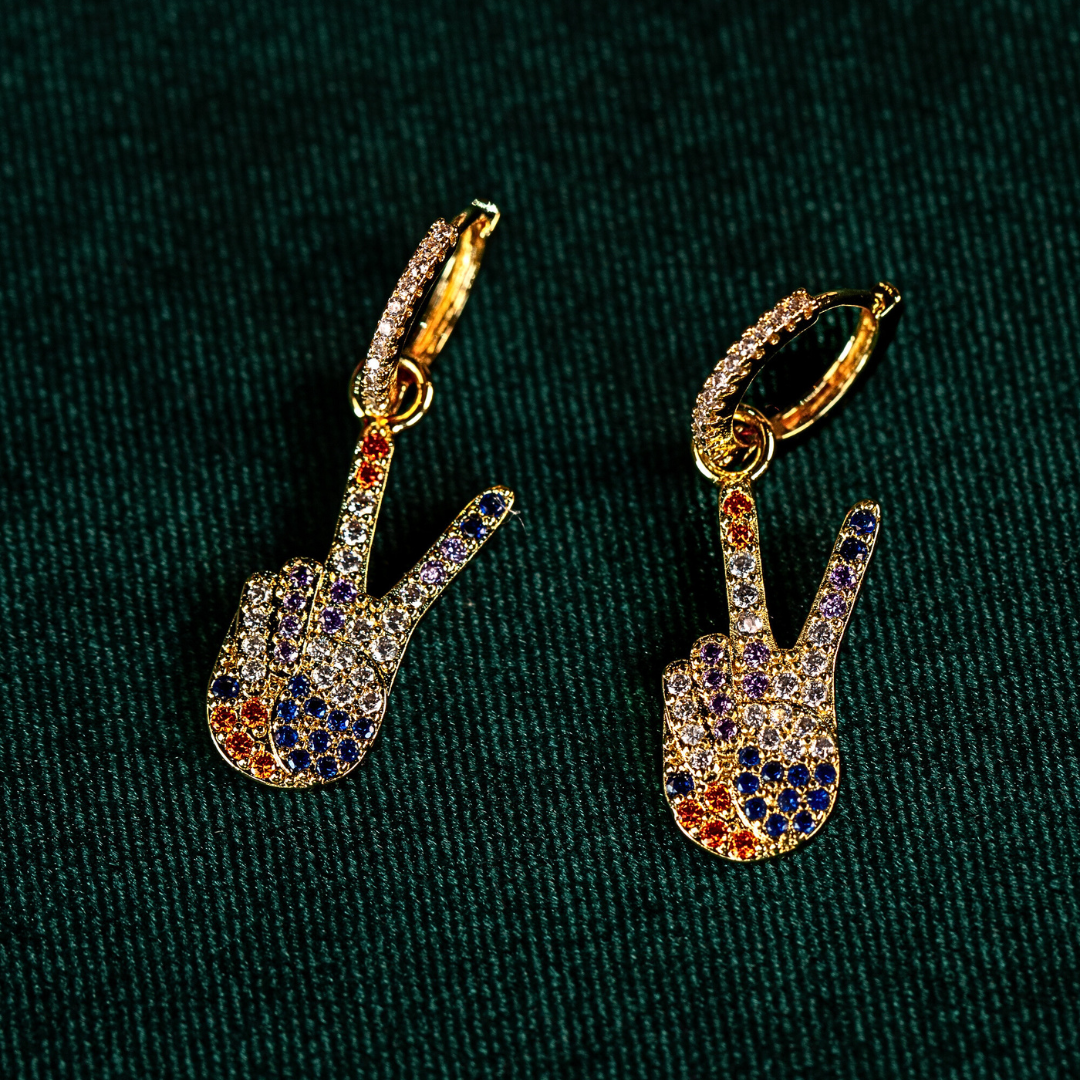 DYLAN peace sign zircon huggies