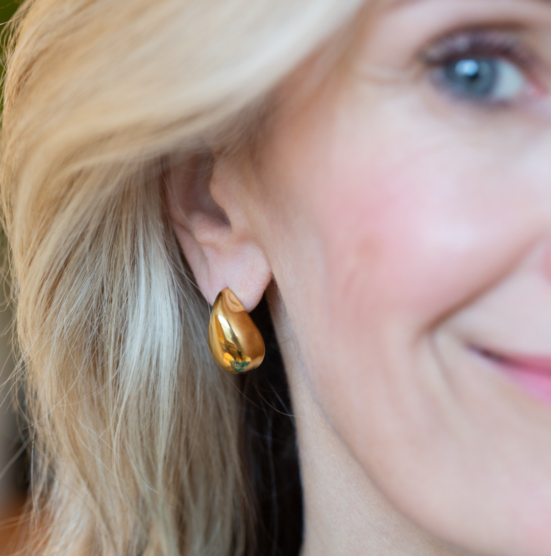 Gold teardrop studs