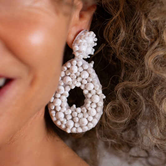 White beaded statement earrings