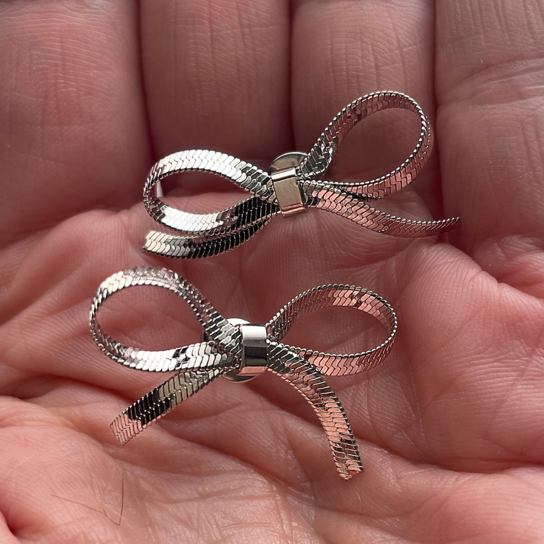 KELLY silver tone bow stud earrings