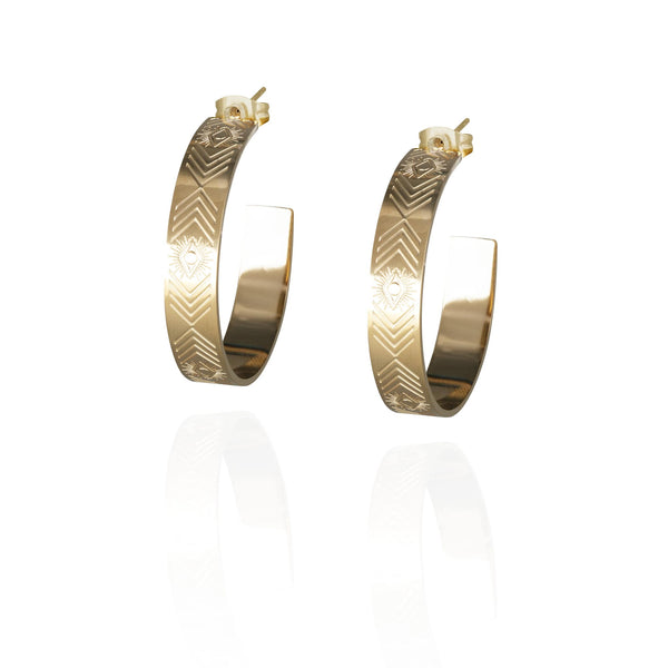 Pair of gold hoop pierced earrings with aztec pattern