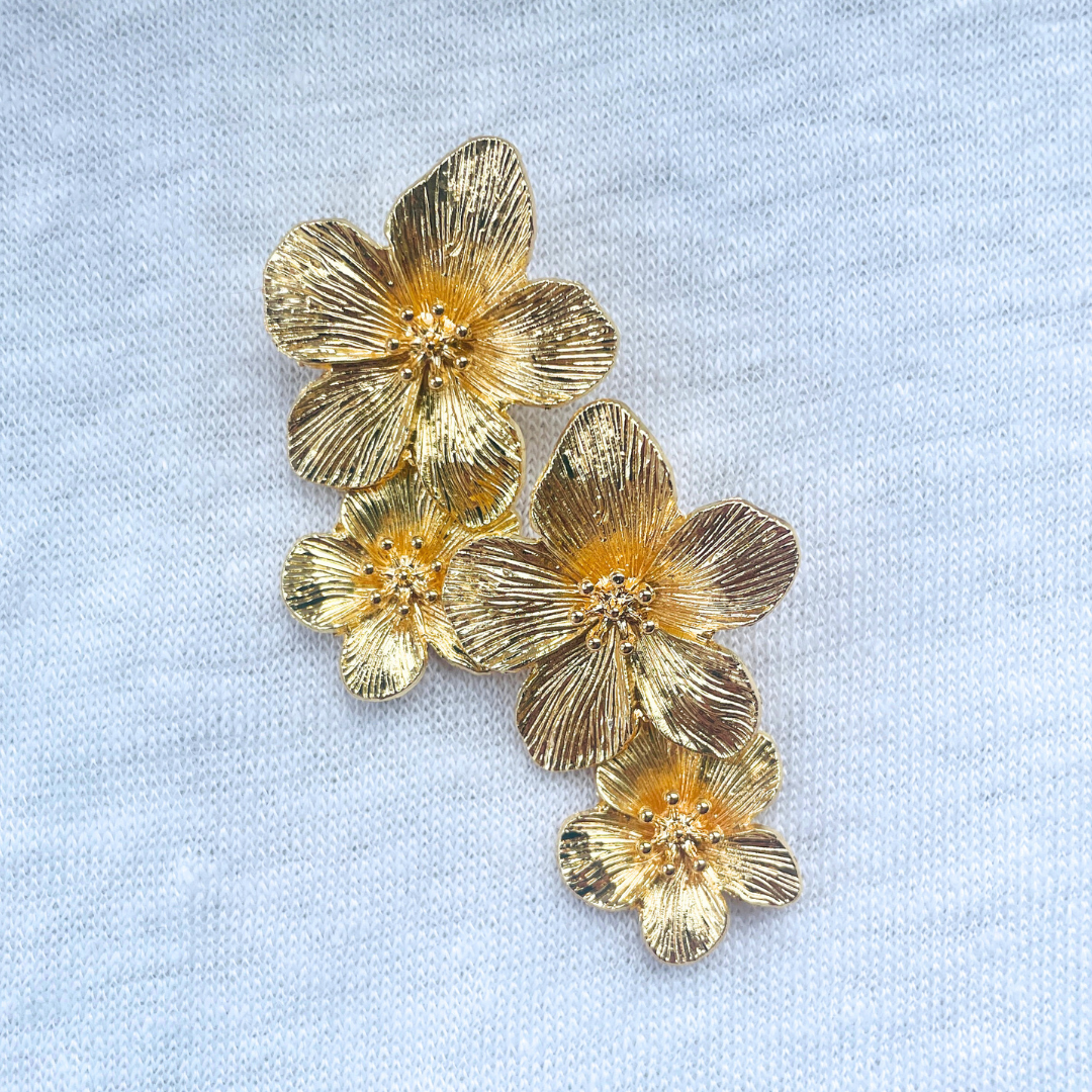 Gold flower statement earrings