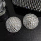 Disco ball statement earrings