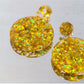 Yellow disco dangle earrings