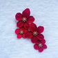 Red flower statement earrings