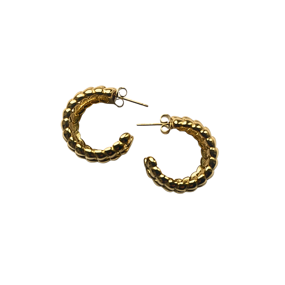Gold chunky hoops with heart detail