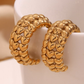 Gold chunky hoops with heart detail