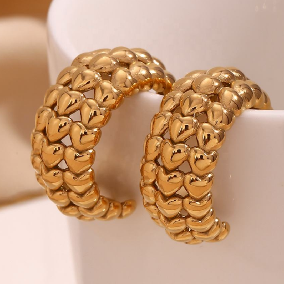 Gold chunky hoops with heart detail