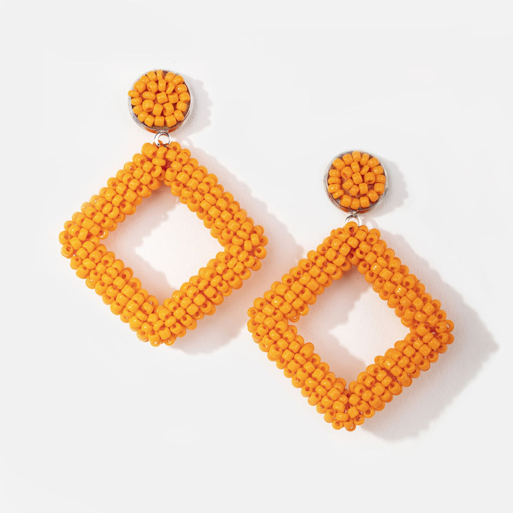 Pair of orange beaded dangle earrings with large stud and square pendant  