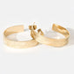 Pair of gold hoop pierced earrings with aztec pattern